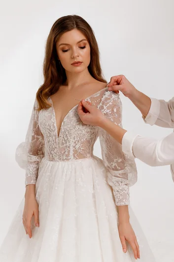 Professional wedding dress neckline and back alterations for perfect coverage and style